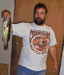 This is a 15 inch largemouth bass caught by Ed on 9/11/98 with a floating Rapala on Lake Bosworth.